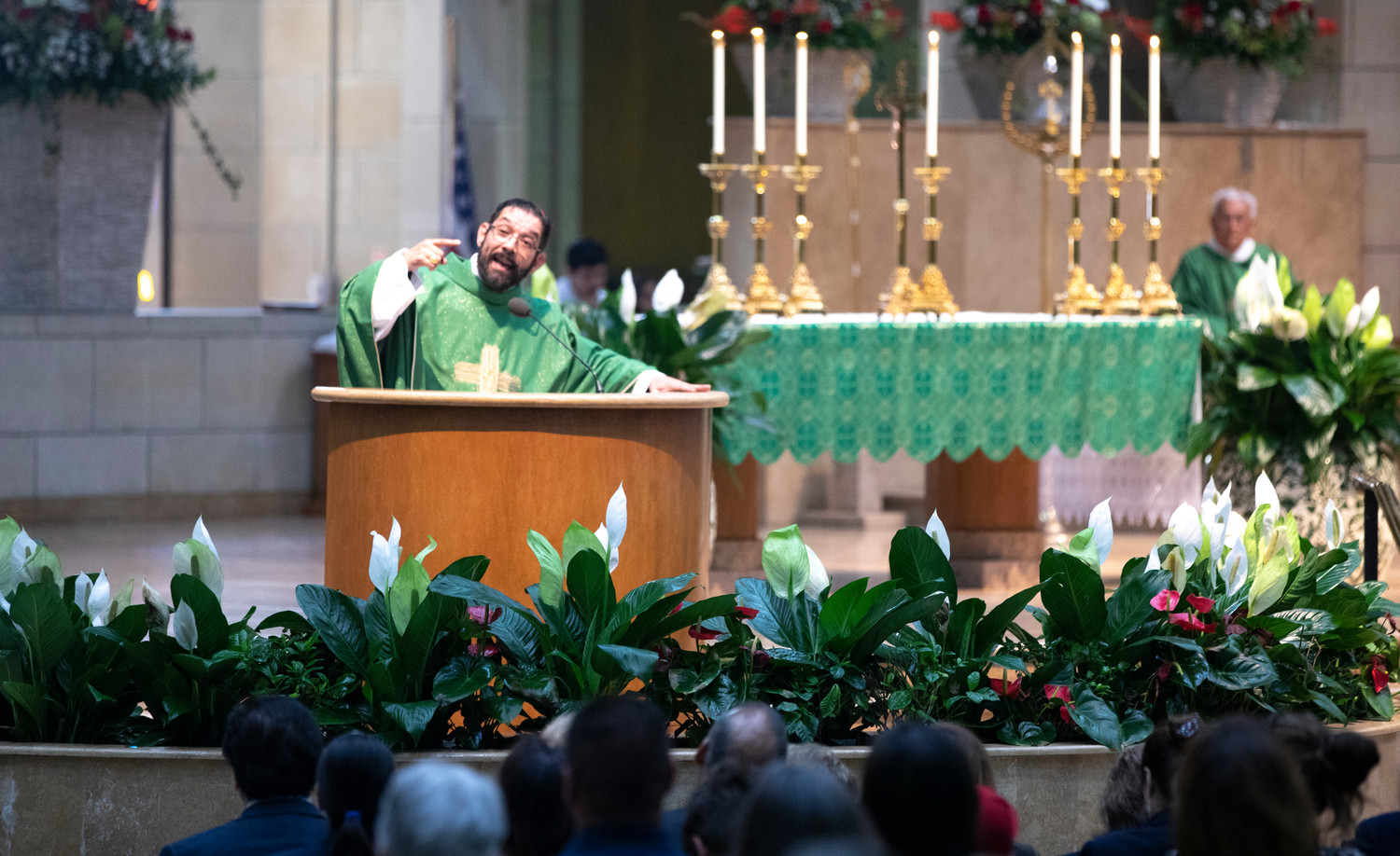 Bishop Daniel E. Flores of Brownsville, Texas, delivers his homily July 1 at the Basilica of Our Lady of San Juan del Valle in San Juan, Texas. A delegation of U.S. bishops concelebrated the Mass at the start of their fact-finding mission about Central American immigrant detention at the U.S.-Mexican border.